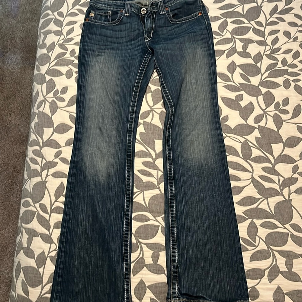 Gently uses, great pair boot cut long blue jeans